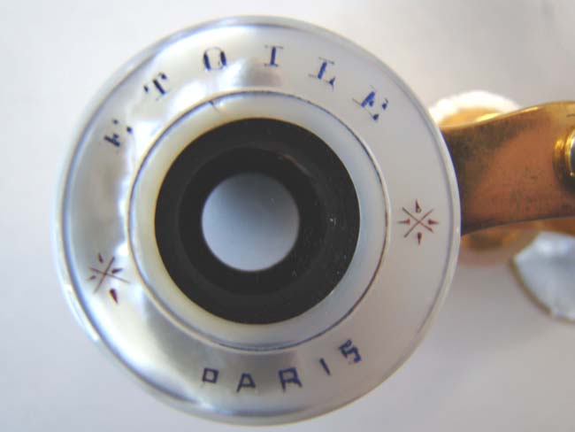 A very fine pair of late 19th century French Opera Glasses with folding handle — image 6